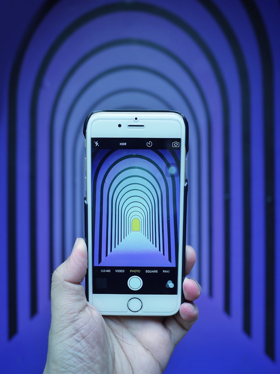 Photo by Danist Soh person holding silver iPhone 6